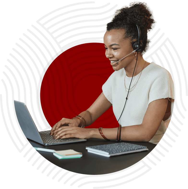 woman working on laptop using voip apps and service