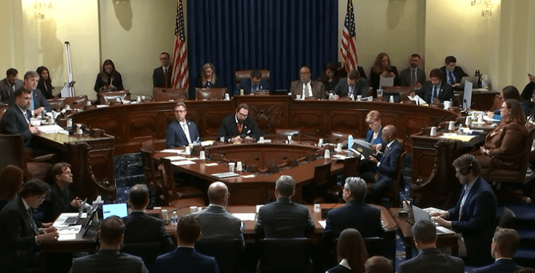 "Students in a computer lab working on cybersecurity exercises, showcasing the role of community colleges in preparing for cybersecurity careers."