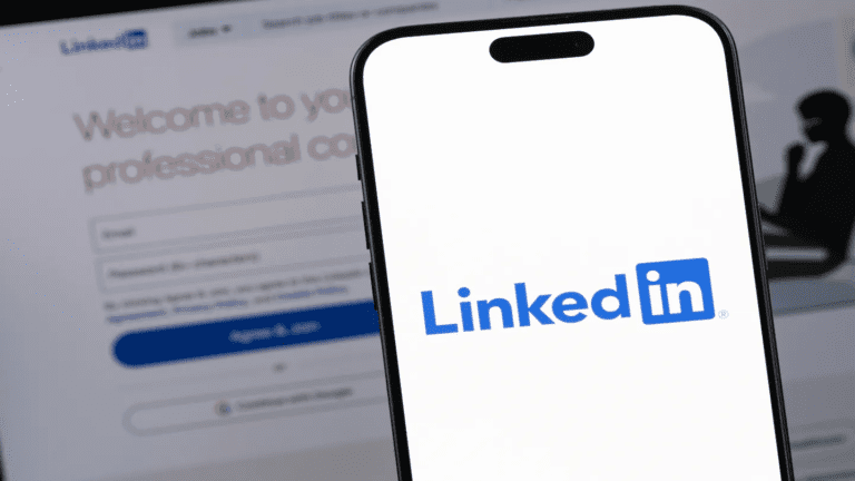 "Smartphone displaying LinkedIn app with highlighted settings, symbolizing LinkedIn Premium data AI training concerns, privacy, and cybersecurity."