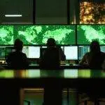 Cybersecurity expert analyzing ransomware threats to protect business data.